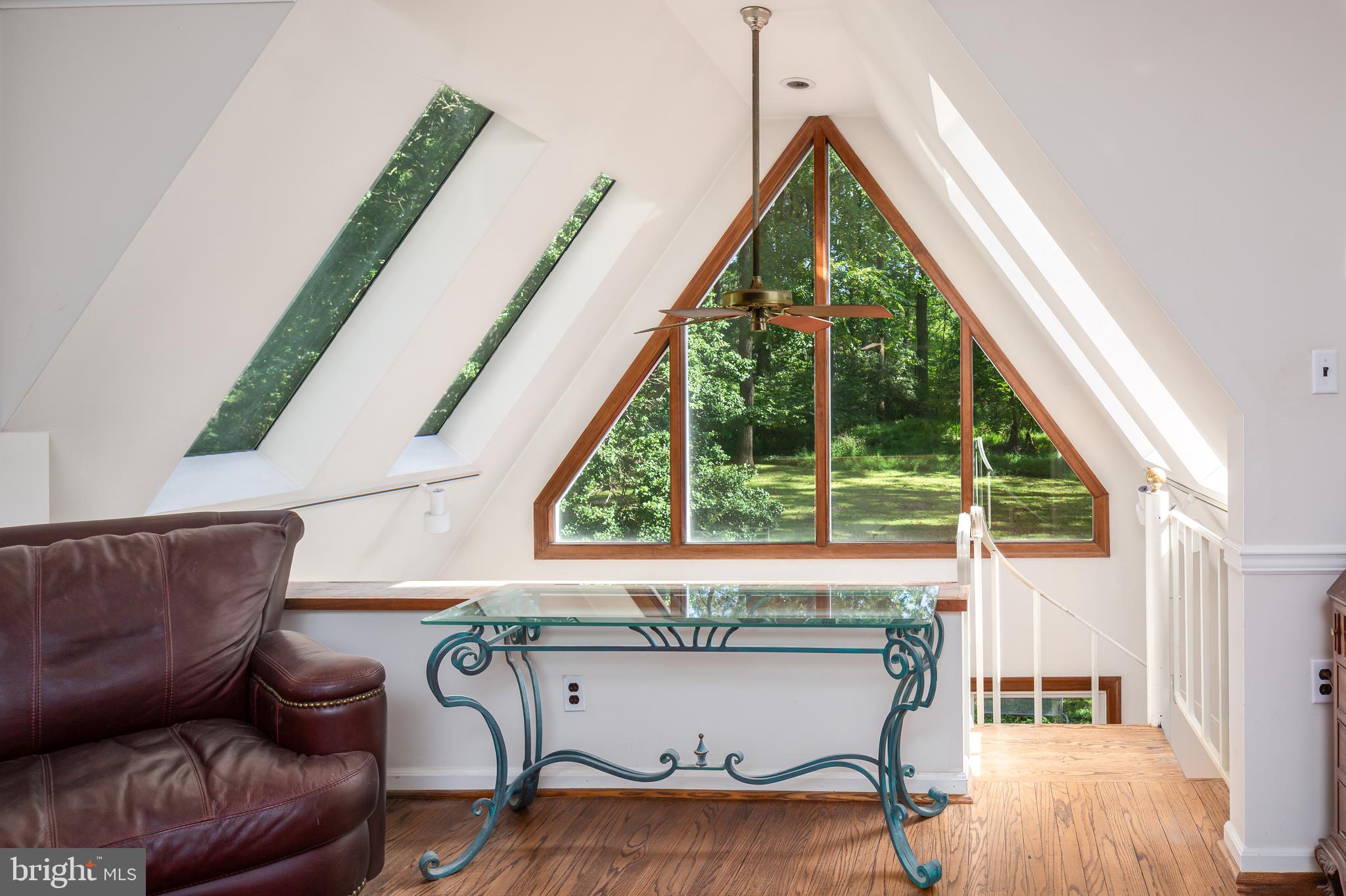 8 Fox Chase Road Malvern, PA 19355 - Photo 27 of 49 a living room with furniture and a large window