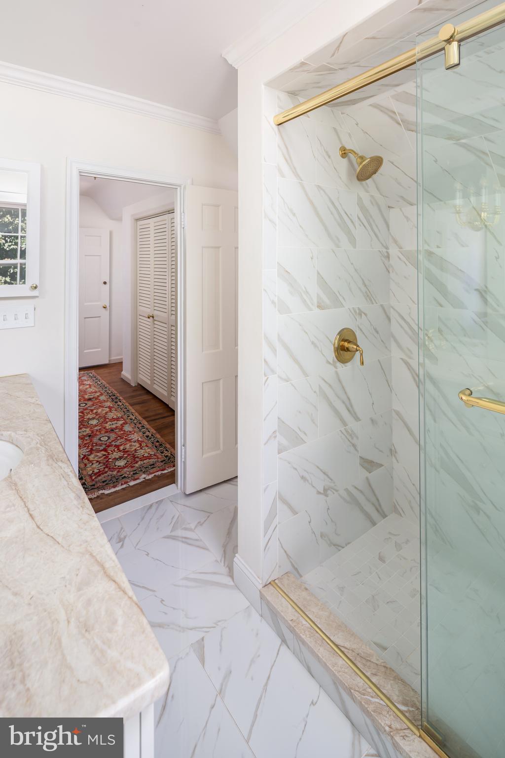8 Fox Chase Road Malvern, PA 19355 - Photo 32 of 49 a bathroom with a bathtub and shower