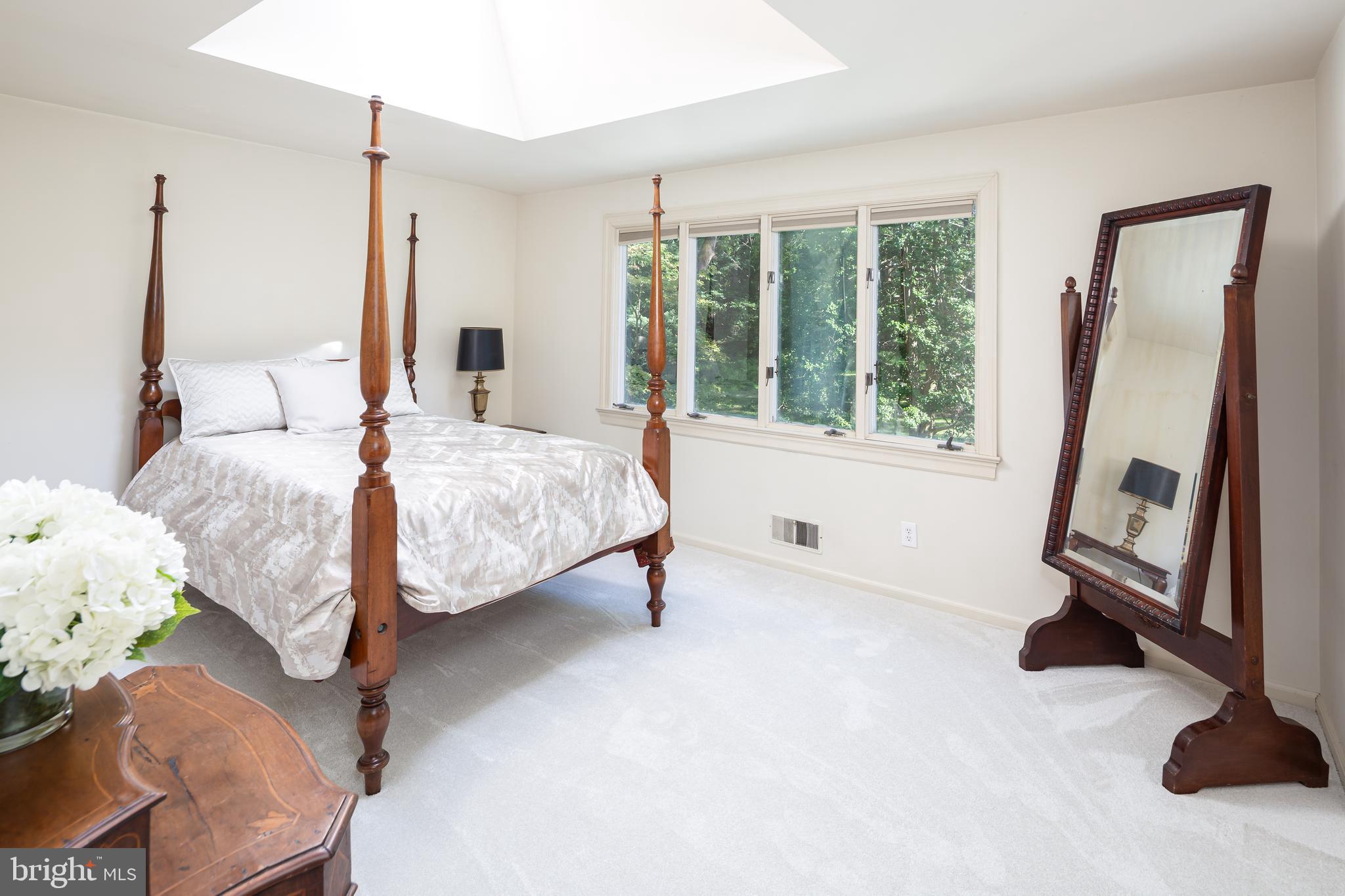 8 Fox Chase Road Malvern, PA 19355 - Photo 34 of 49 a bedroom with a bed and a window