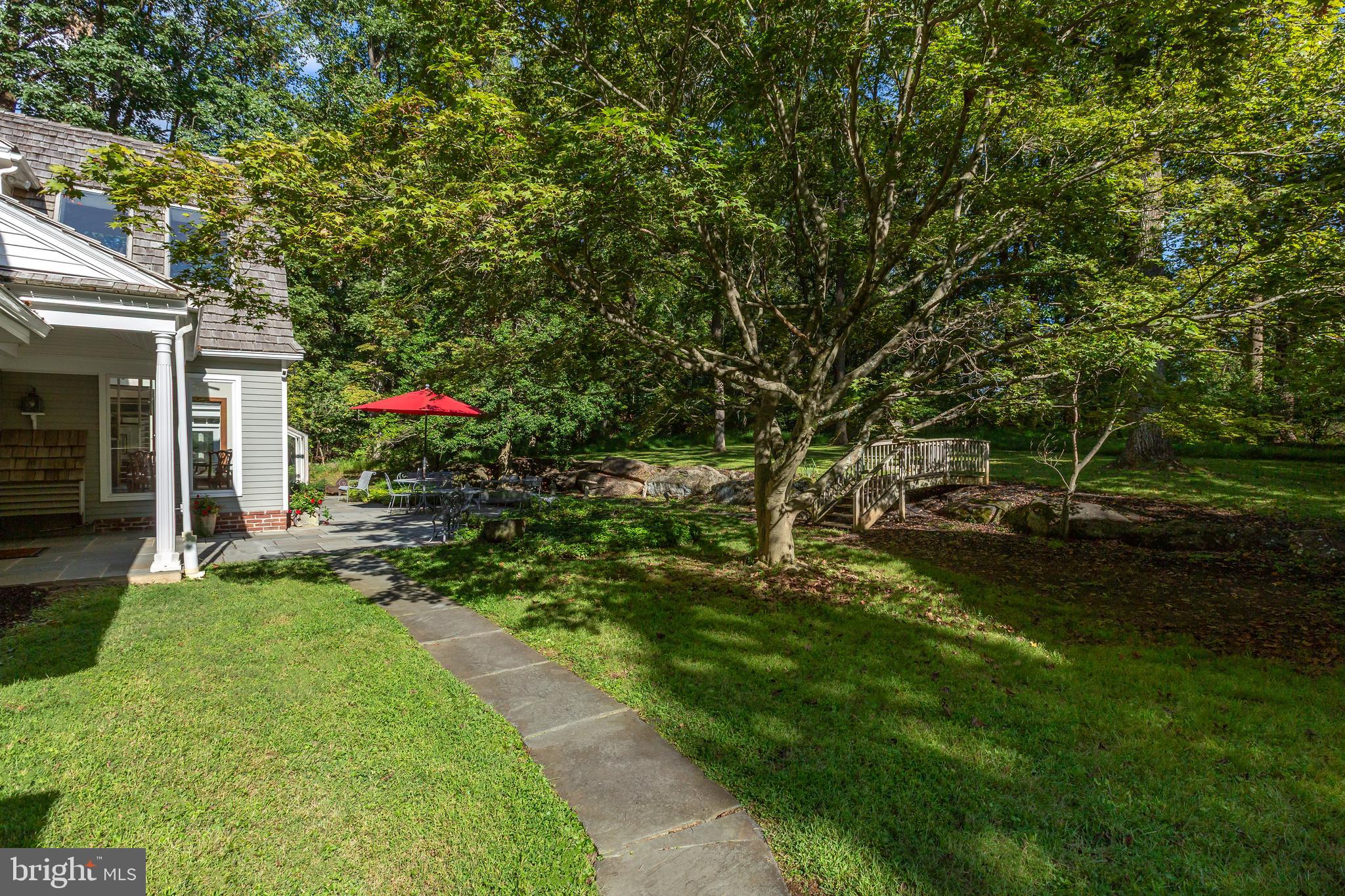 8 Fox Chase Road Malvern, PA 19355 - Photo 44 of 49 a view of a house with a backyard and garden