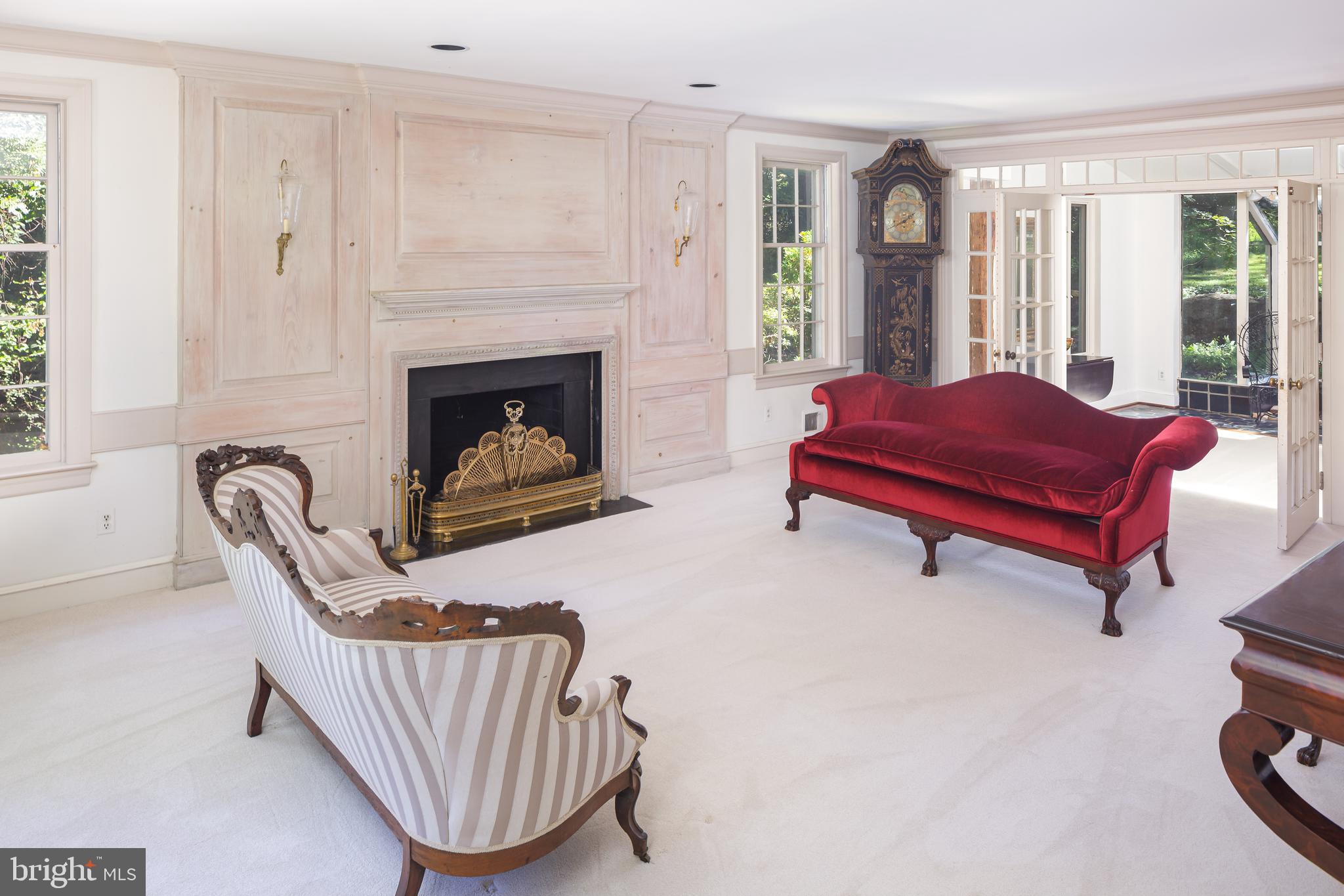 8 Fox Chase Road Malvern, PA 19355 - Photo 8 of 49 a living room with furniture and a fireplace