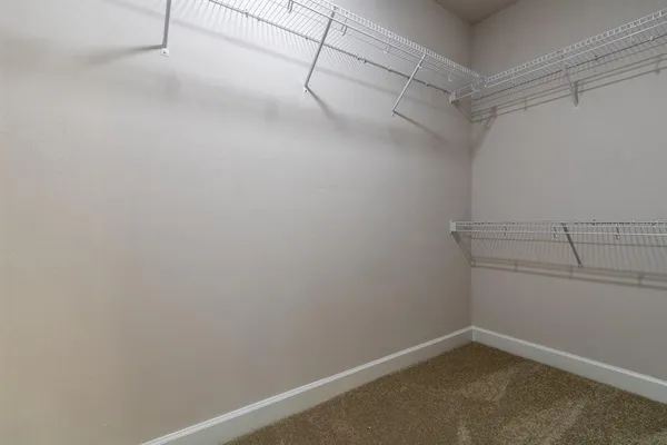 a view of a room with racks on the wall