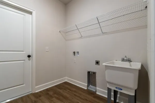 a room with a table and chairs