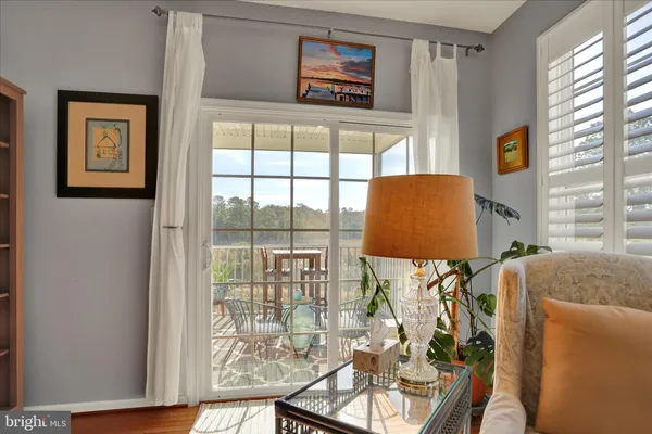 a view of a livingroom with furniture and wooden floor