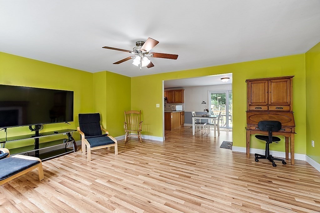 454 Loring Road Barre, MA 01005 - Photo 11 of 42 a living room with furniture and a flat screen tv