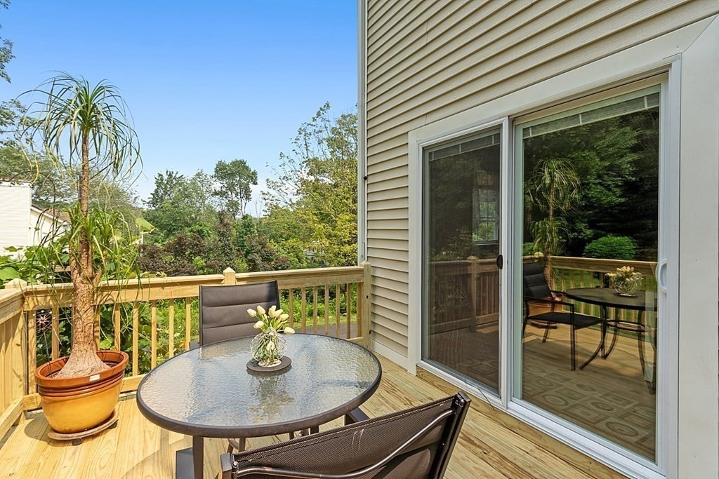 454 Loring Road Barre, MA 01005 - Photo 22 of 42 a balcony with table and chairs