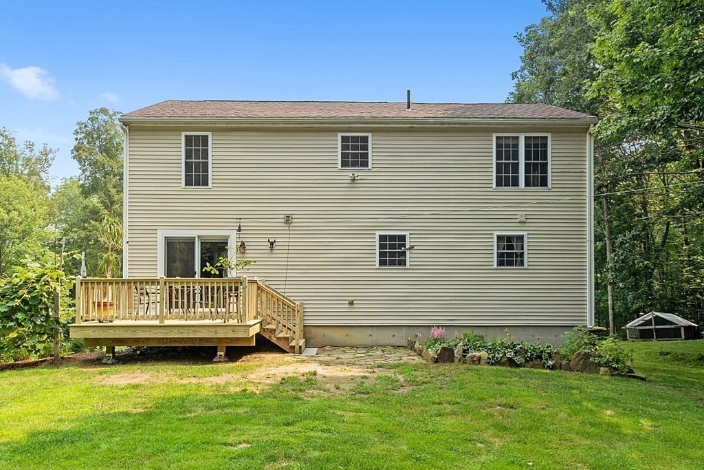 454 Loring Road Barre, MA 01005 - Photo 23 of 42 a view of front of house with a yard
