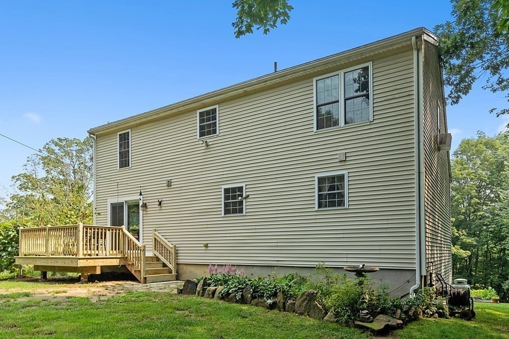 454 Loring Road Barre, MA 01005 - Photo 24 of 42 a view of a house with a yard