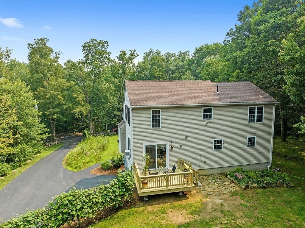 454 Loring Road Barre, MA 01005 - Photo 38 of 42 aerial view of a house with a yard