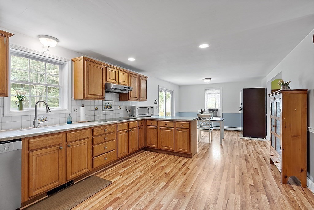 454 Loring Road Barre, MA 01005 - Photo 4 of 42 a large kitchen with stainless steel appliances granite countertop a lot of counter space and a sink