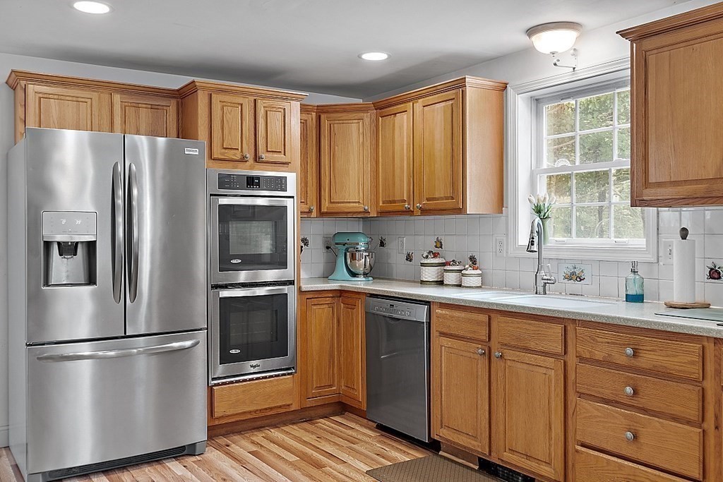 454 Loring Road Barre, MA 01005 - Photo 9 of 42 a kitchen with stainless steel appliances granite countertop a refrigerator sink and cabinets
