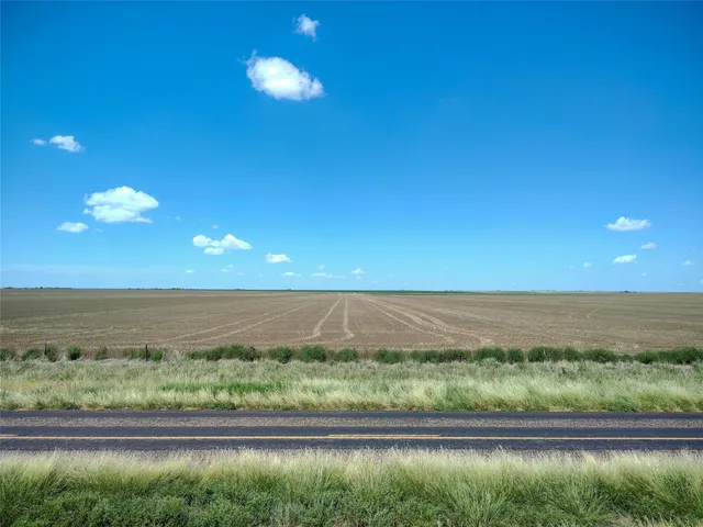 a view of lake with a yard