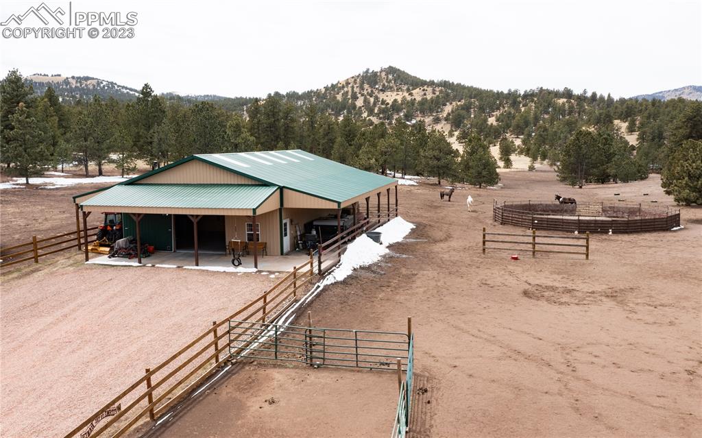 1321 Bristlecone Road Guffey, CO 80820 - Photo 3 of 37 a view of a house with roof and a sitting area