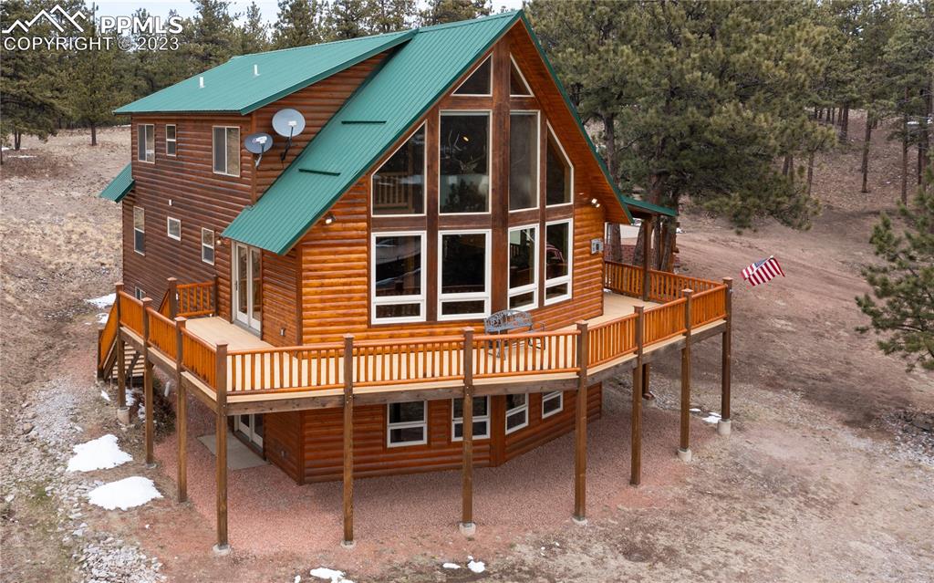 1321 Bristlecone Road Guffey, CO 80820 - Photo 36 of 37 a view of a house with a yard