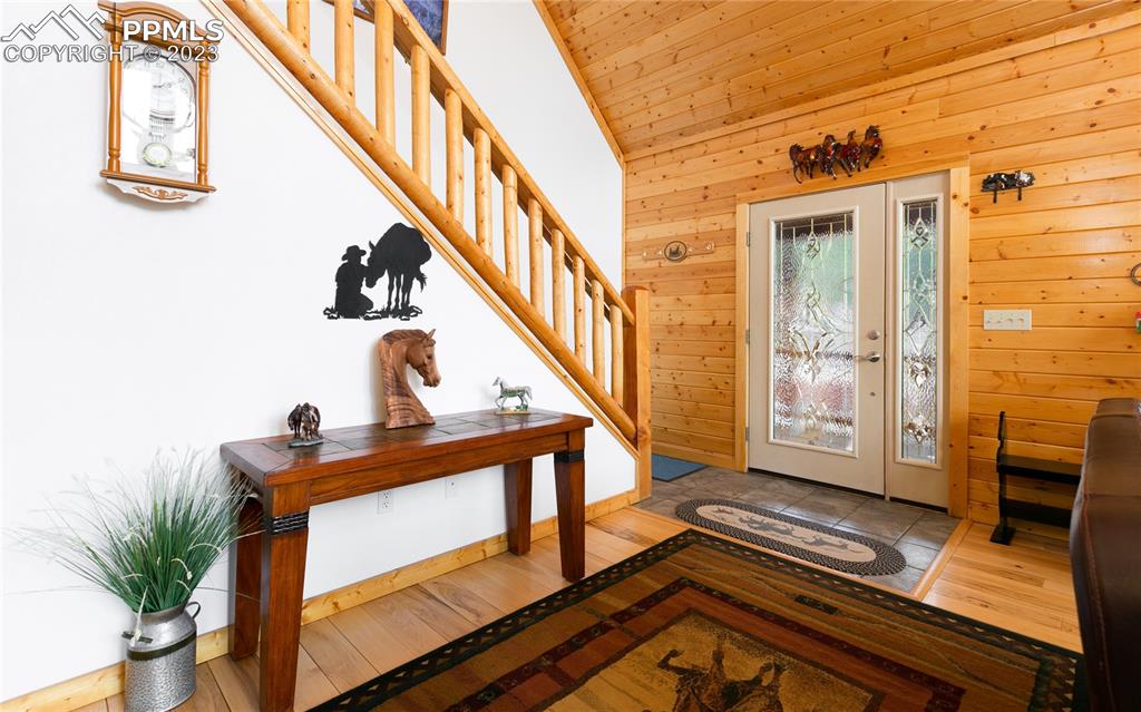 1321 Bristlecone Road Guffey, CO 80820 - Photo 5 of 37 a view of an entryway with wooden floor and front door