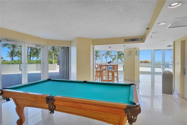 a view of a park with large trees