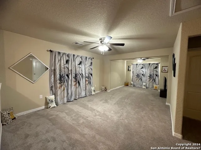 a view of a livingroom with furniture