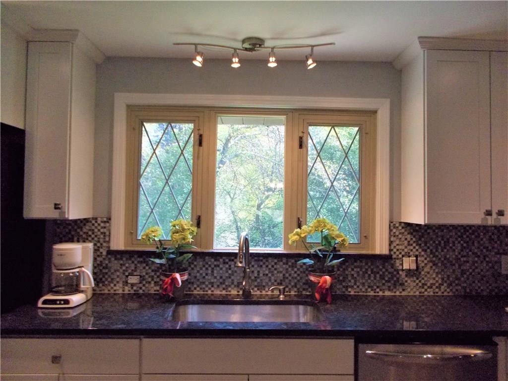 121 Mary Reed Road Baden, PA 15005 - Photo 5 of 24 Granite counter tops.