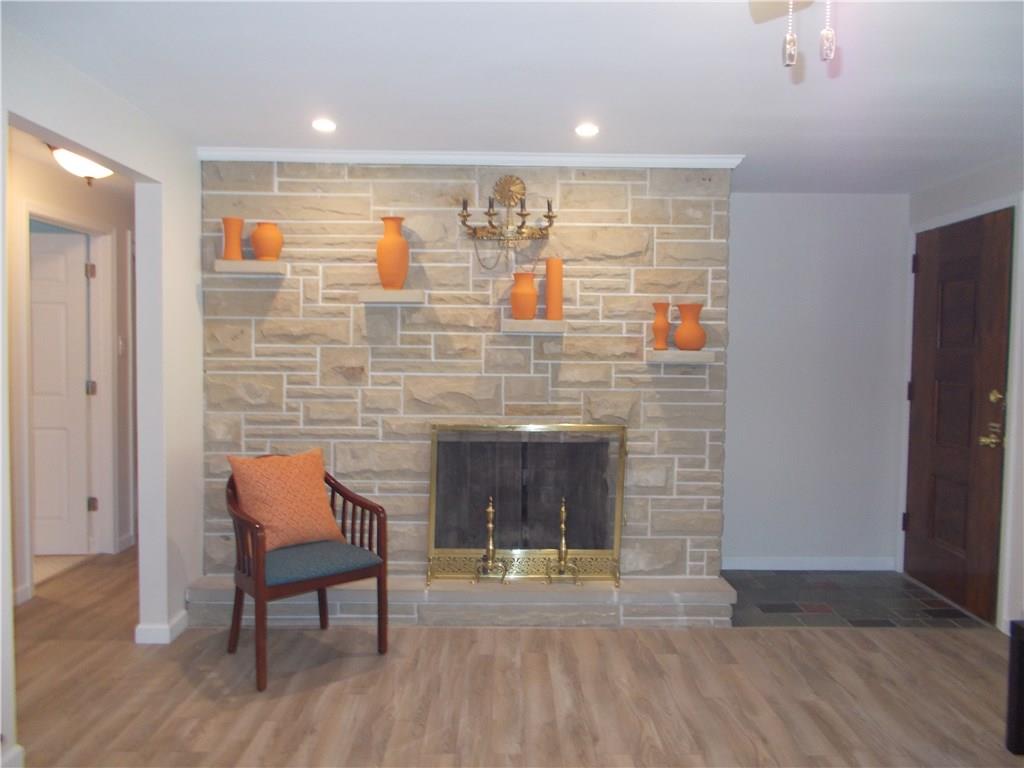 121 Mary Reed Road Baden, PA 15005 - Photo 7 of 24 Living Room. Wood burning fireplace.
