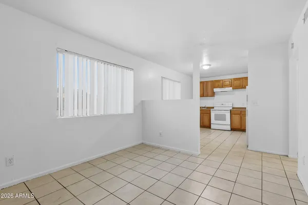 a view of a kitchen with storage and utility