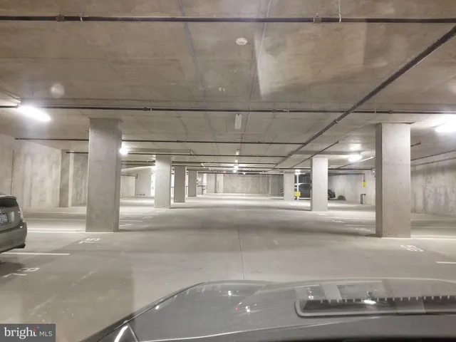 a white toilet sitting next to a white sink