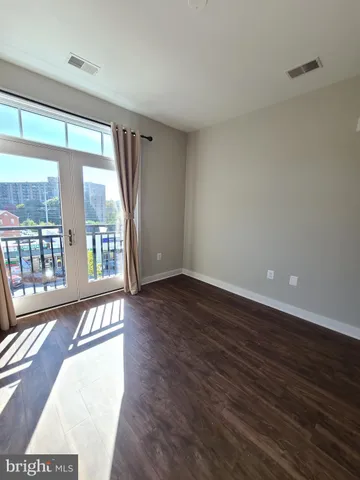 a view of a dinning tables and chairs in a patio of the house