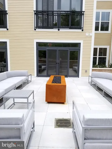 a room with gym equipment and a large window