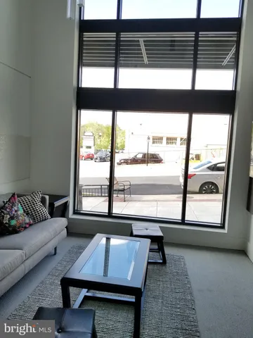 a front view of a building with many windows