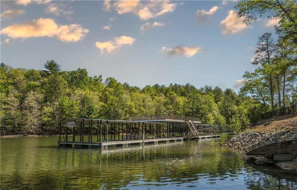 230 Ridge Pointe Way Blairsville, GA 30512 - Photo 13 of 20 a view of a lake with a mountain
