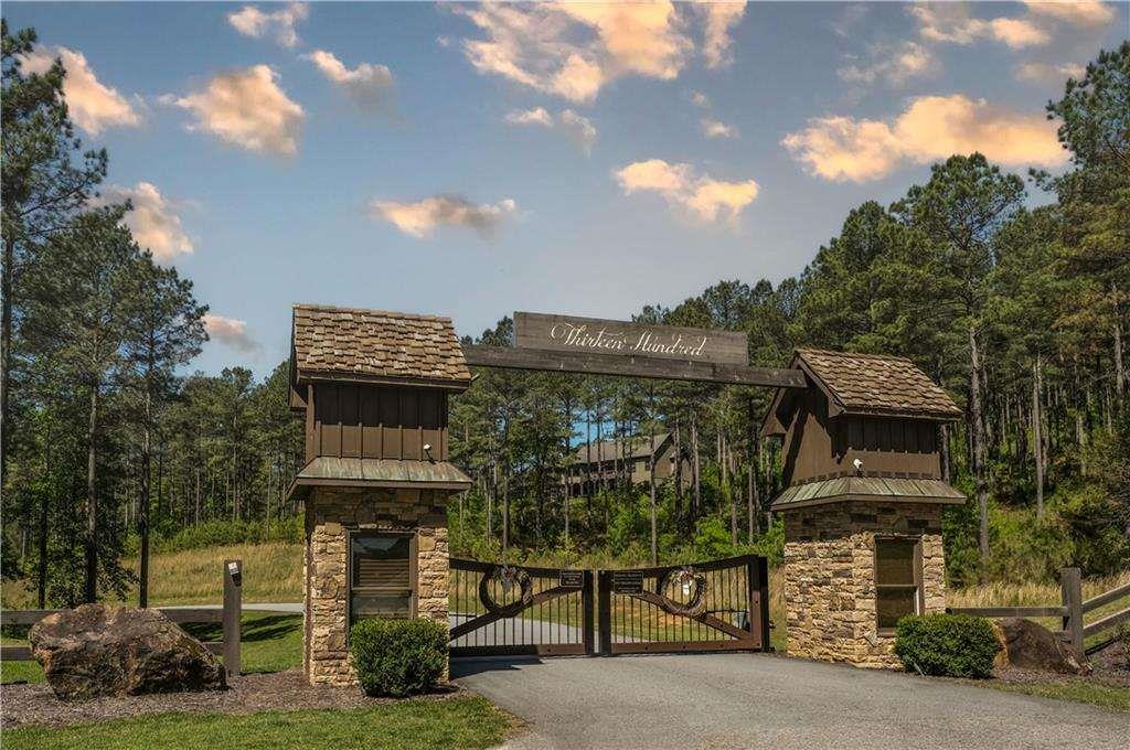 230 Ridge Pointe Way Blairsville, GA 30512 - Photo 20 of 20 a front view of a house with a garden