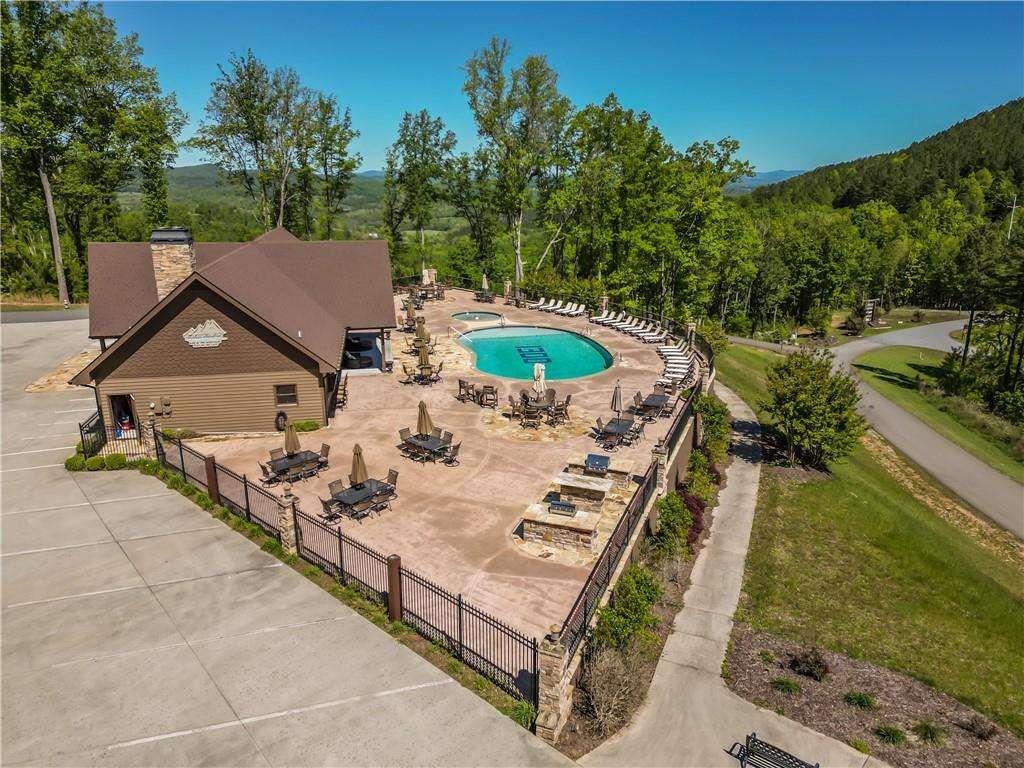 230 Ridge Pointe Way Blairsville, GA 30512 - Photo 2 of 20 an aerial view of a house with swimming pool and garden