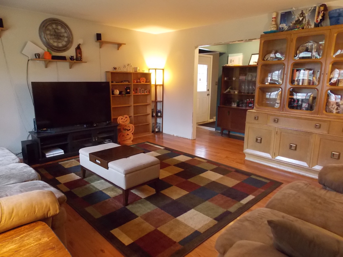 350 Orion Road Batavia, IL 60510 - Photo 2 of 13 a living room with furniture and a flat screen tv