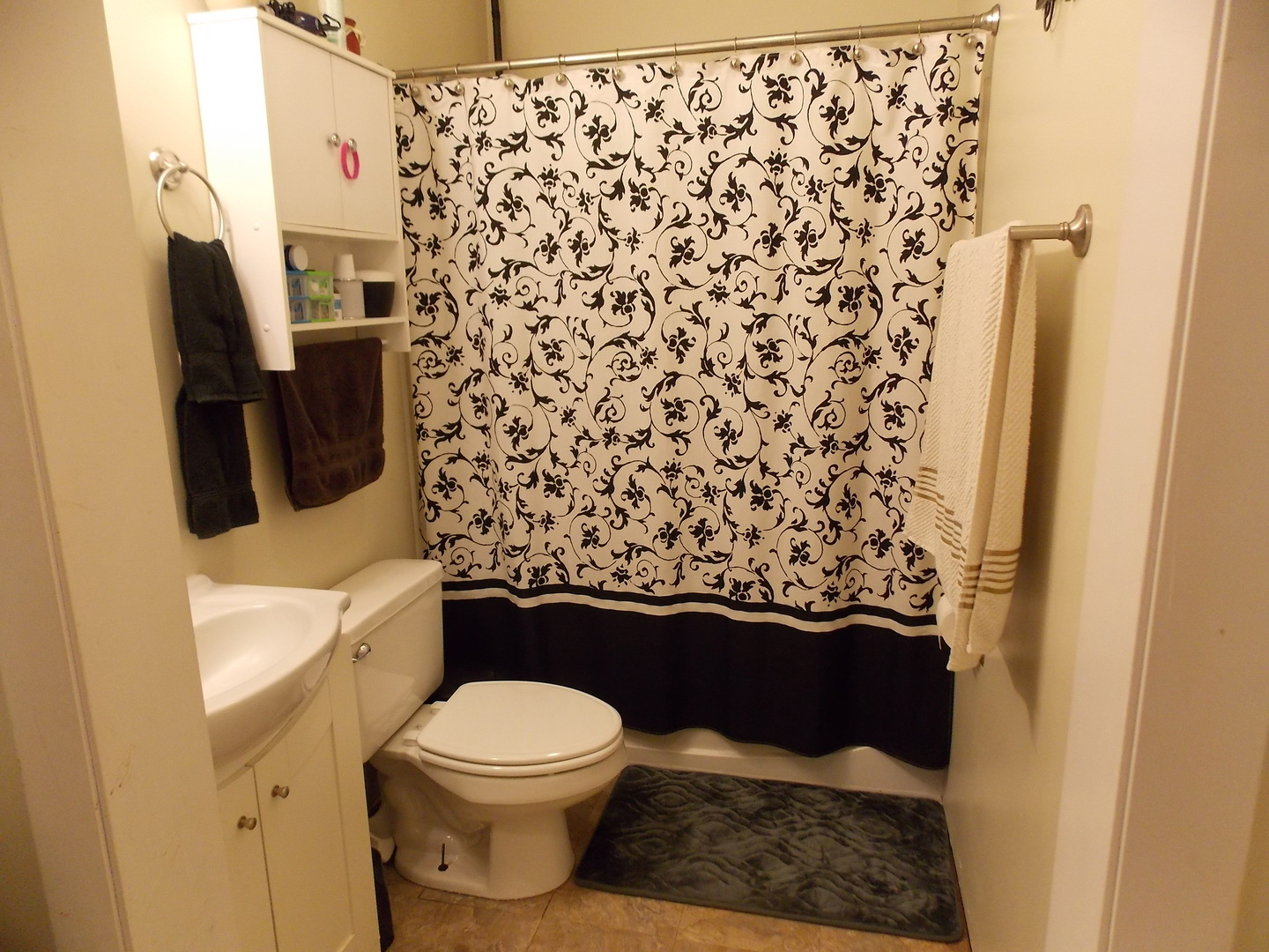 350 Orion Road Batavia, IL 60510 - Photo 11 of 13 a bathroom with a toilet and a shower curtain