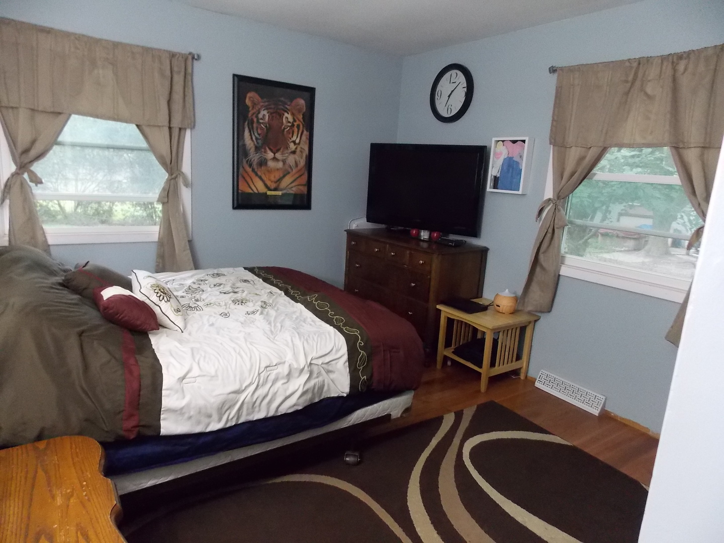 350 Orion Road Batavia, IL 60510 - Photo 7 of 13 a bedroom with a bed and a flat screen tv