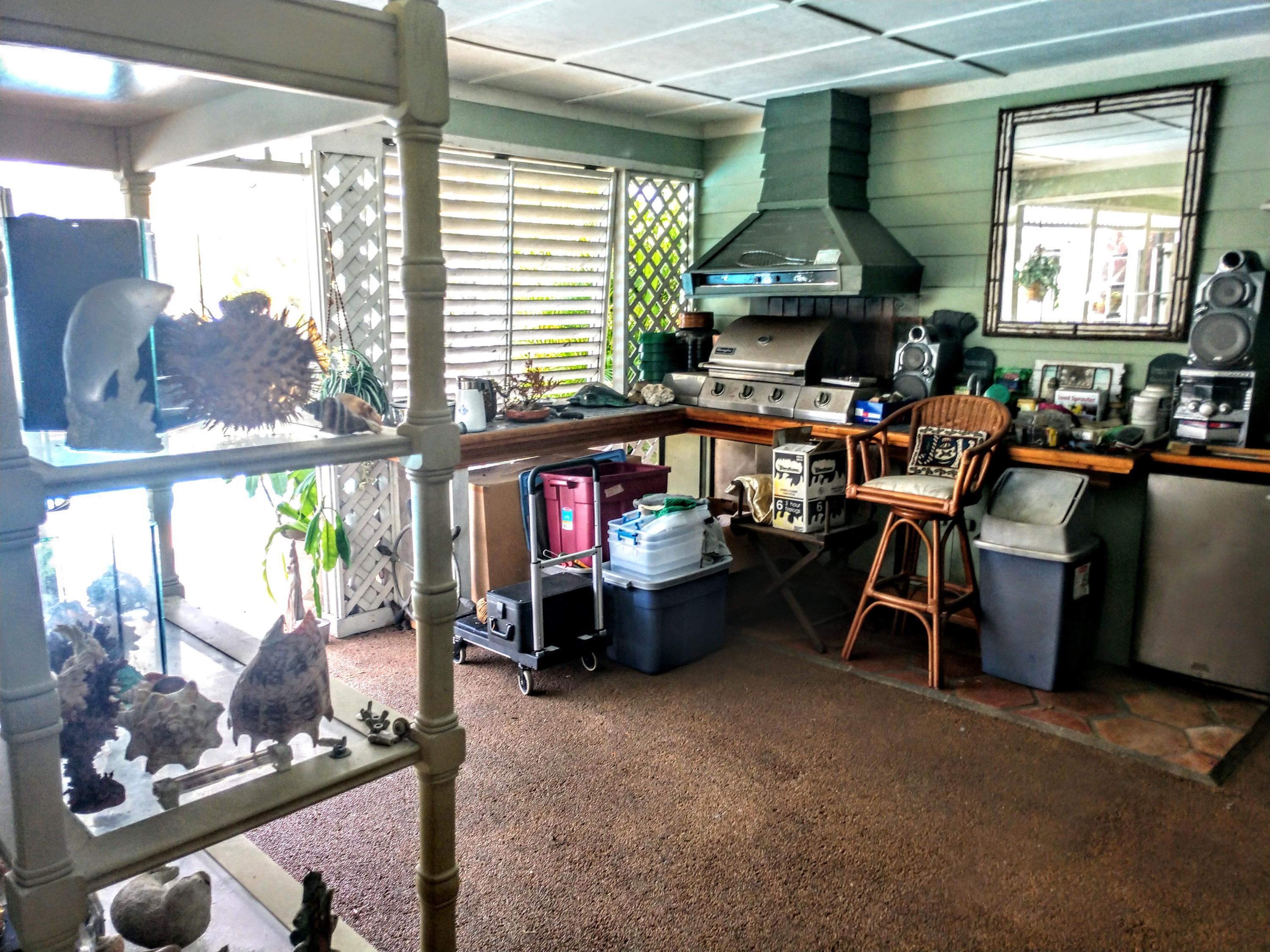 696 Southwest Aster Road Port St. Lucie, FL 34953 - Photo 14 of 16 Summer Kitchen