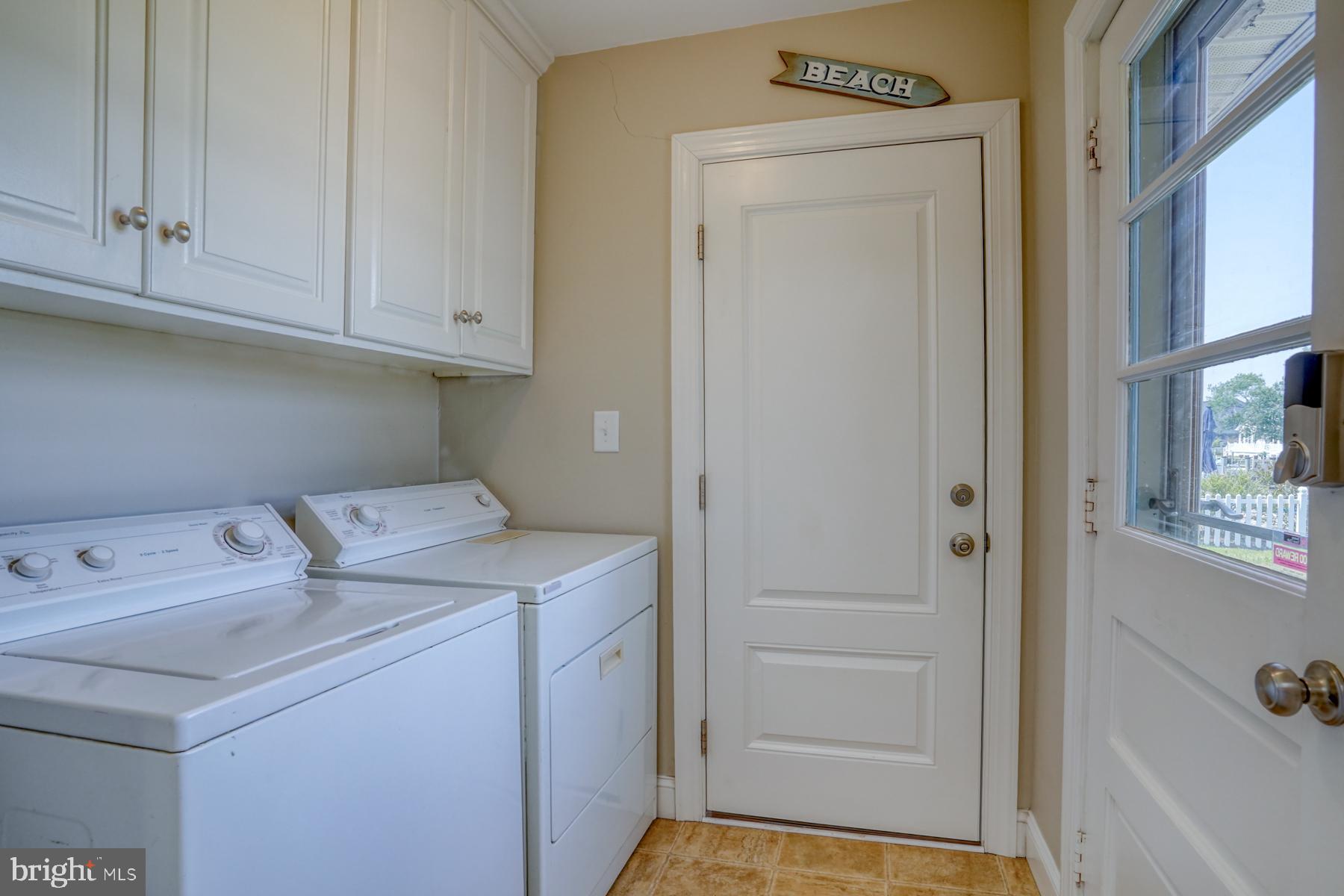28 Marshall Road Rehoboth Beach, DE 19971 - Photo 34 of 60 a utility room with dryer and washer