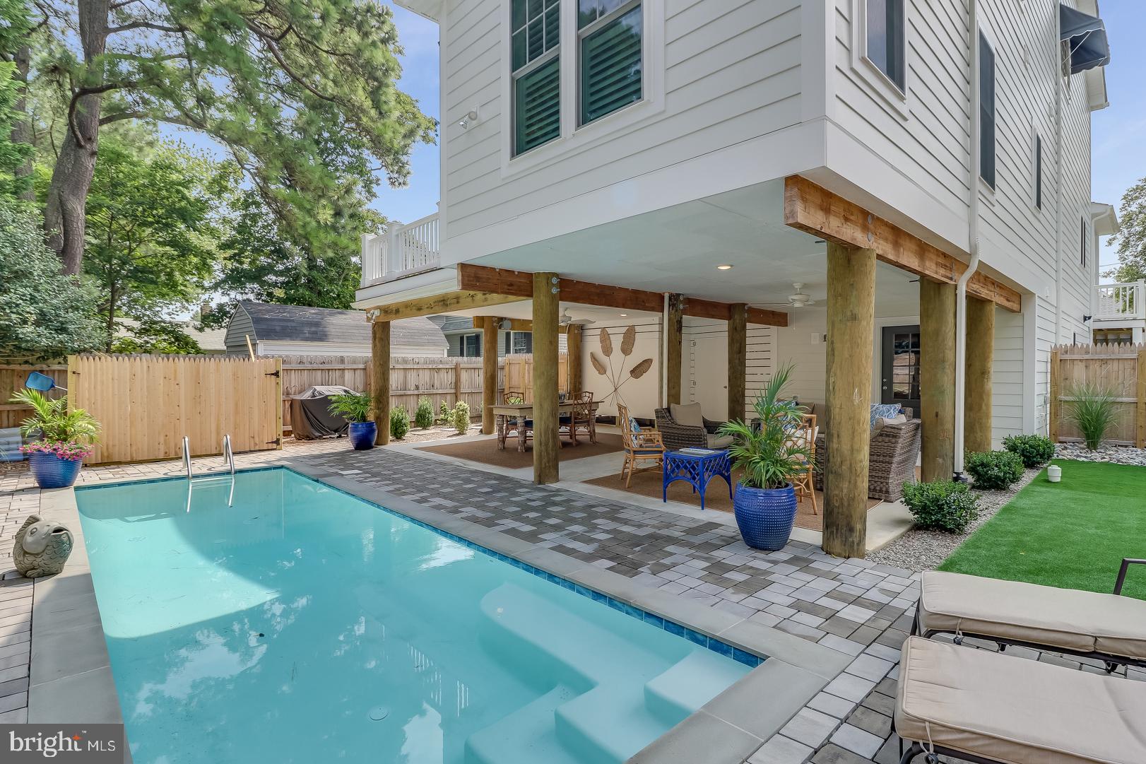 28 Marshall Road Rehoboth Beach, DE 19971 - Photo 43 of 60 a view of a house with backyard and sitting area