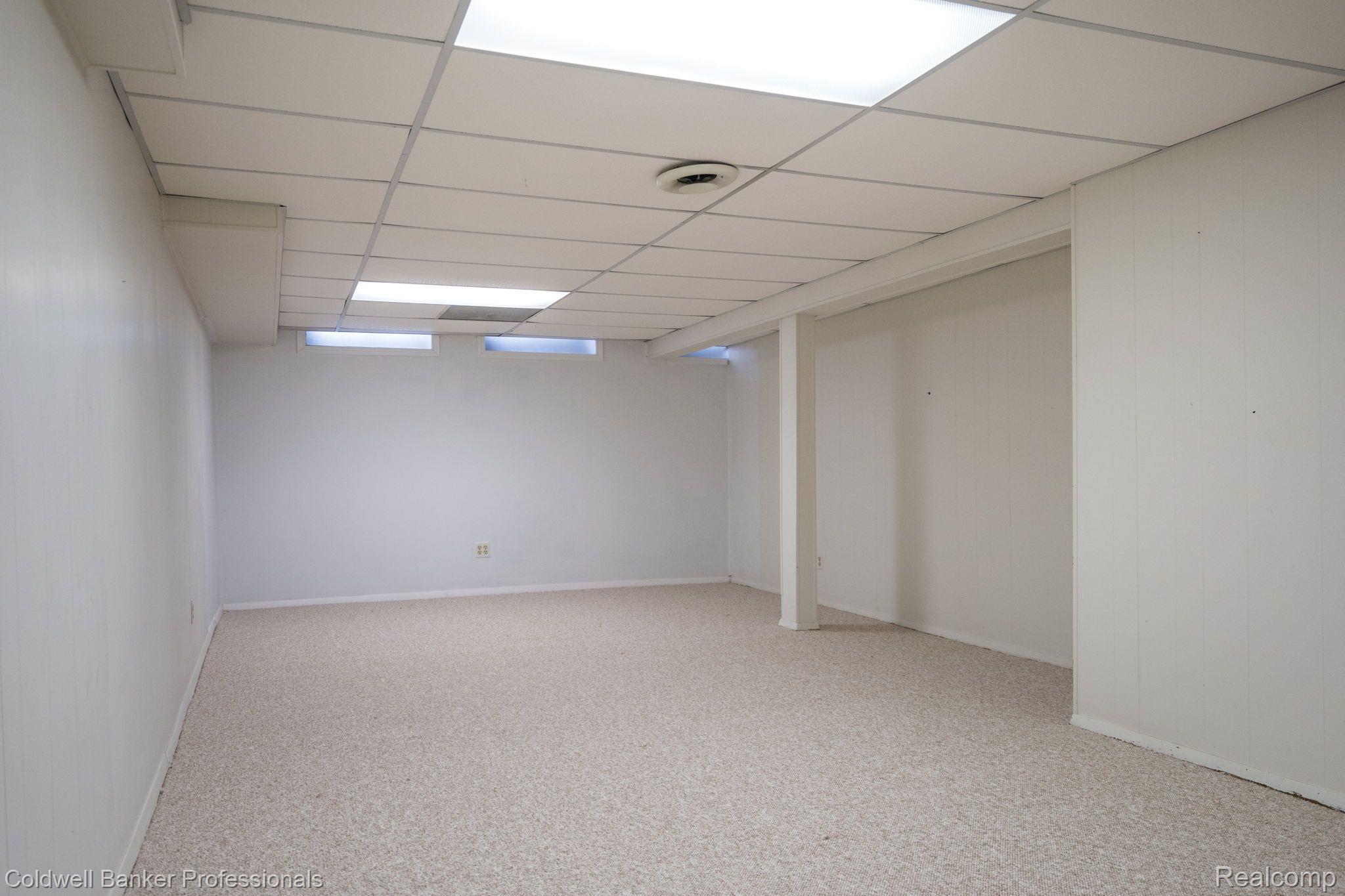 2464 Kimberly Fair Street Rochester, MI 48309 - Photo 28 of 36 Lower level game room with new carpet and paint