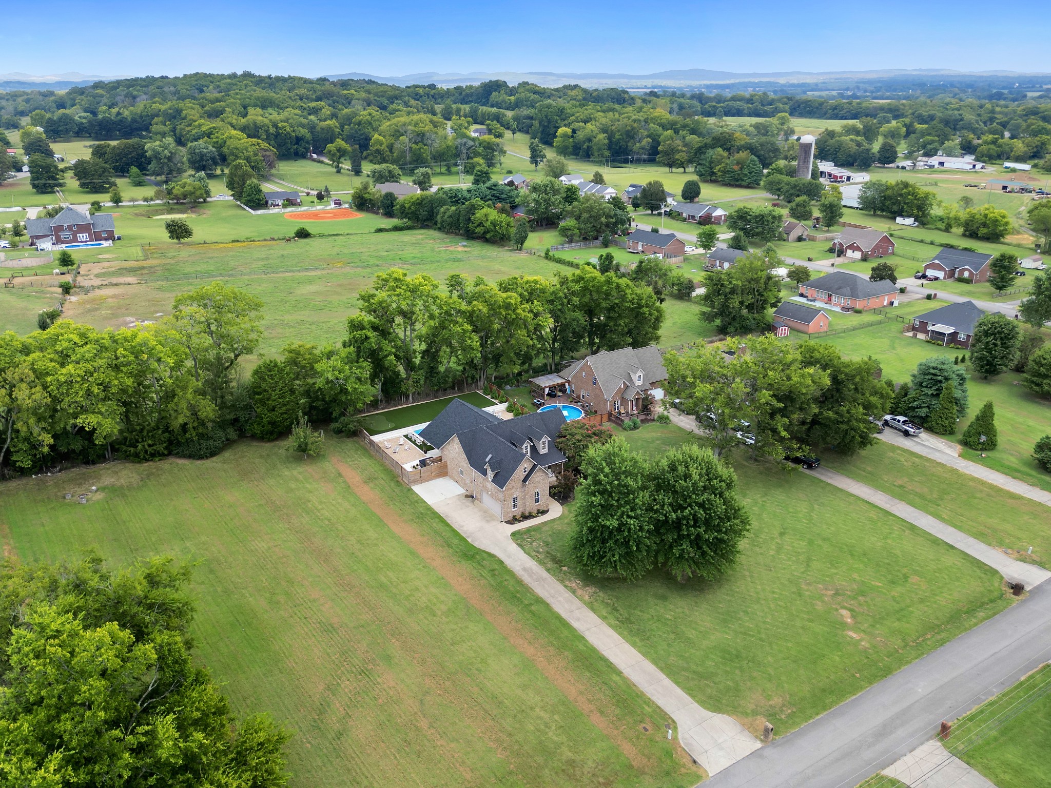 1014 Proud Eagle Eagleville, TN 37060 - Photo 11 of 59 a view of a garden with a building in the background