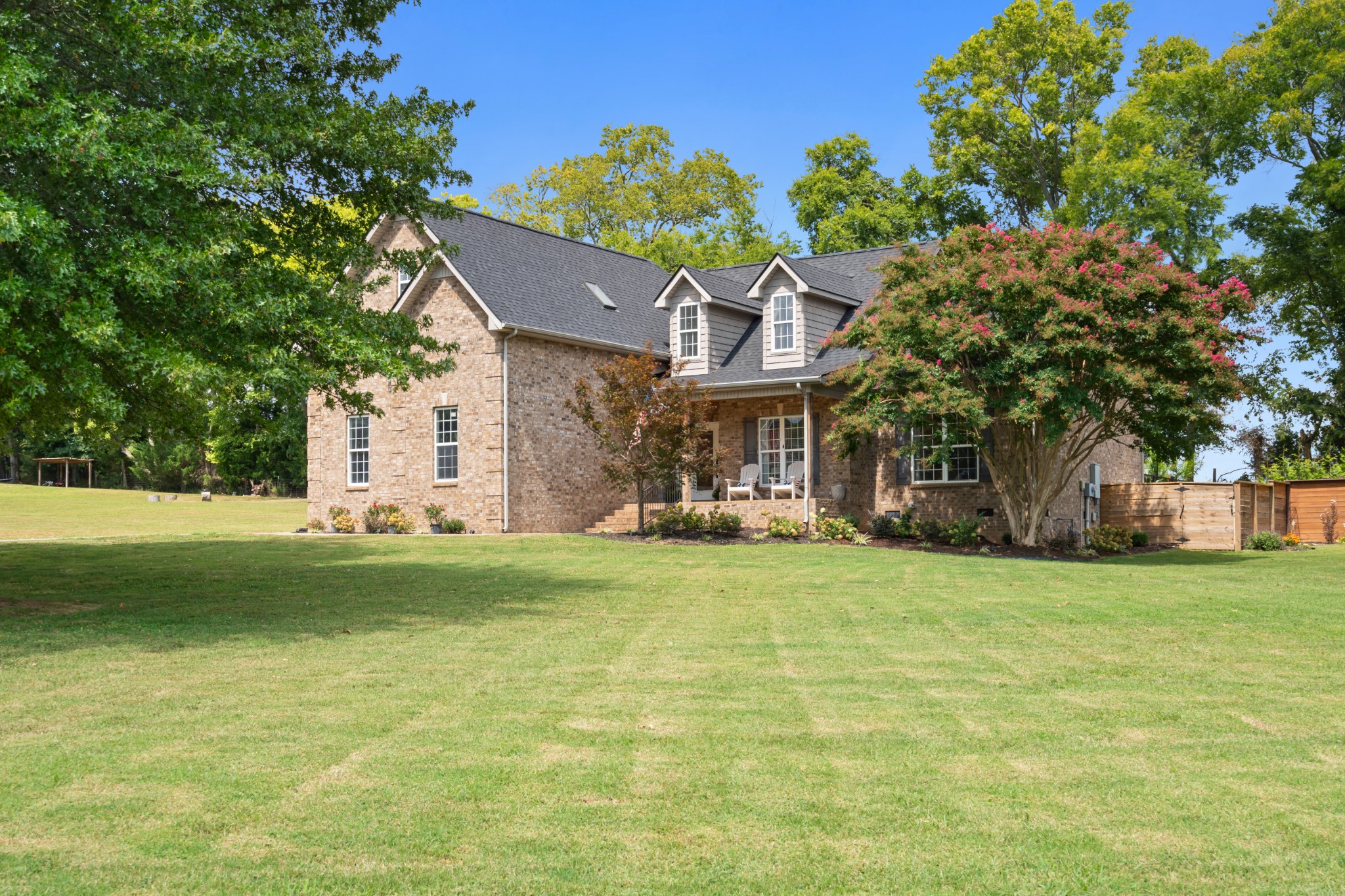 1014 Proud Eagle Eagleville, TN 37060 - Photo 3 of 59 a front view of a house with a garden
