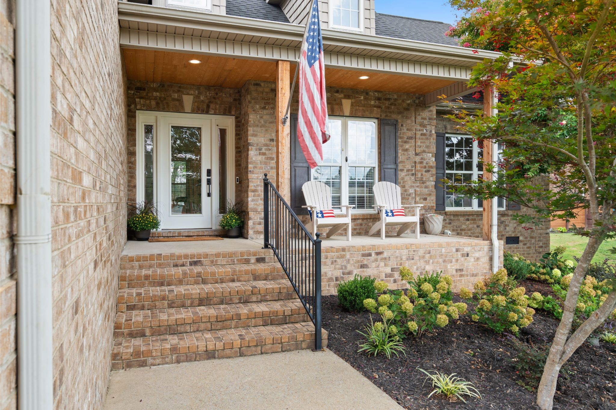 1014 Proud Eagle Eagleville, TN 37060 - Photo 7 of 59 a view of a house with potted plants and a fountain