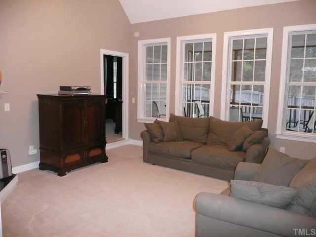 100 Crossfire Road Holly Springs, NC 27540 - Photo 3 of 11 Family Room with Gas Logs and Lots of Windows.