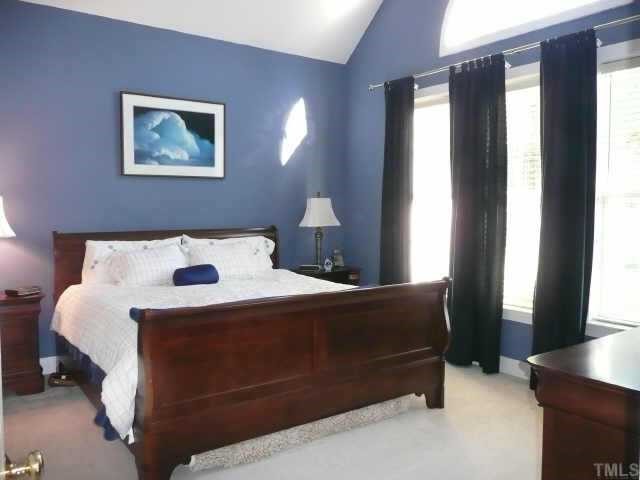 100 Crossfire Road Holly Springs, NC 27540 - Photo 7 of 11 Master Bedroom with Large Windows and Cathedral Ceiling