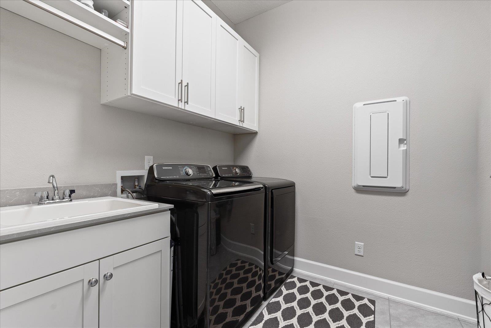 122 Kendall Way Street St. Augustine, FL 32092 - Photo 20 of 40 a utility room with sink dryer and washer