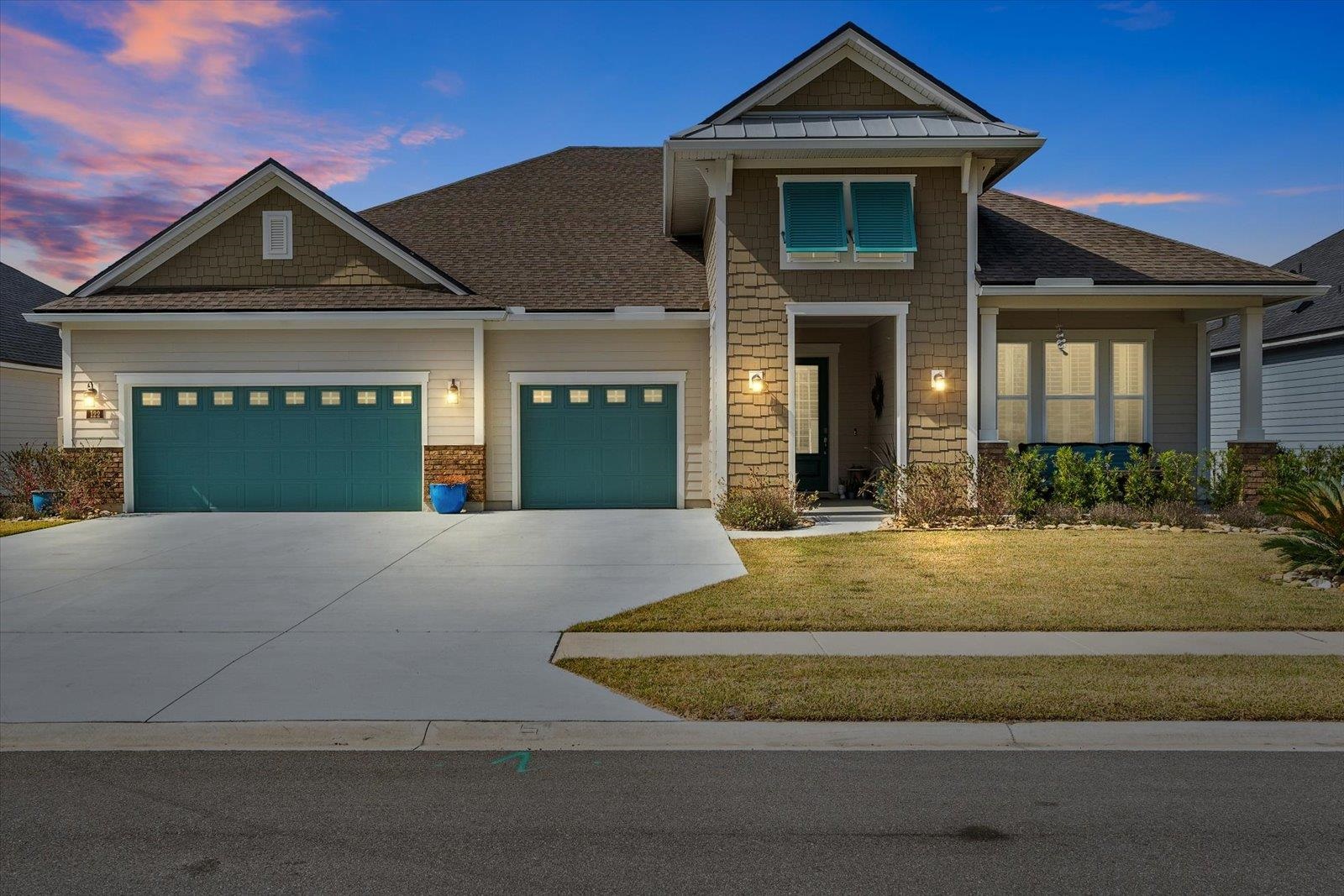 122 Kendall Way Street St. Augustine, FL 32092 - Photo 2 of 40 a front view of a house with a yard
