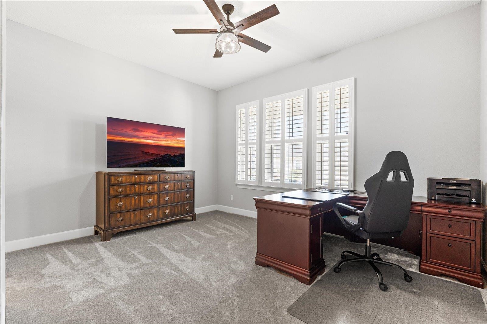 122 Kendall Way Street St. Augustine, FL 32092 - Photo 21 of 40 a view of a workspace with furniture and a window