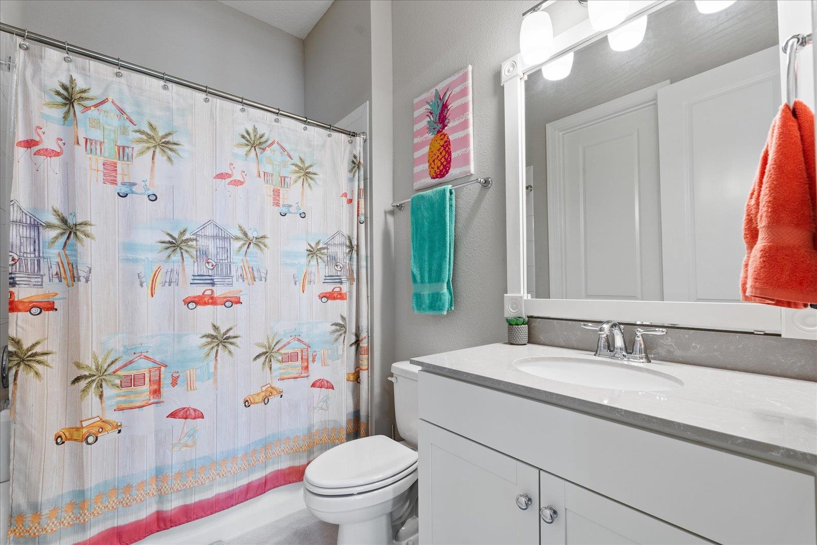 122 Kendall Way Street St. Augustine, FL 32092 - Photo 22 of 40 a bathroom with a sink a toilet and shower curtain