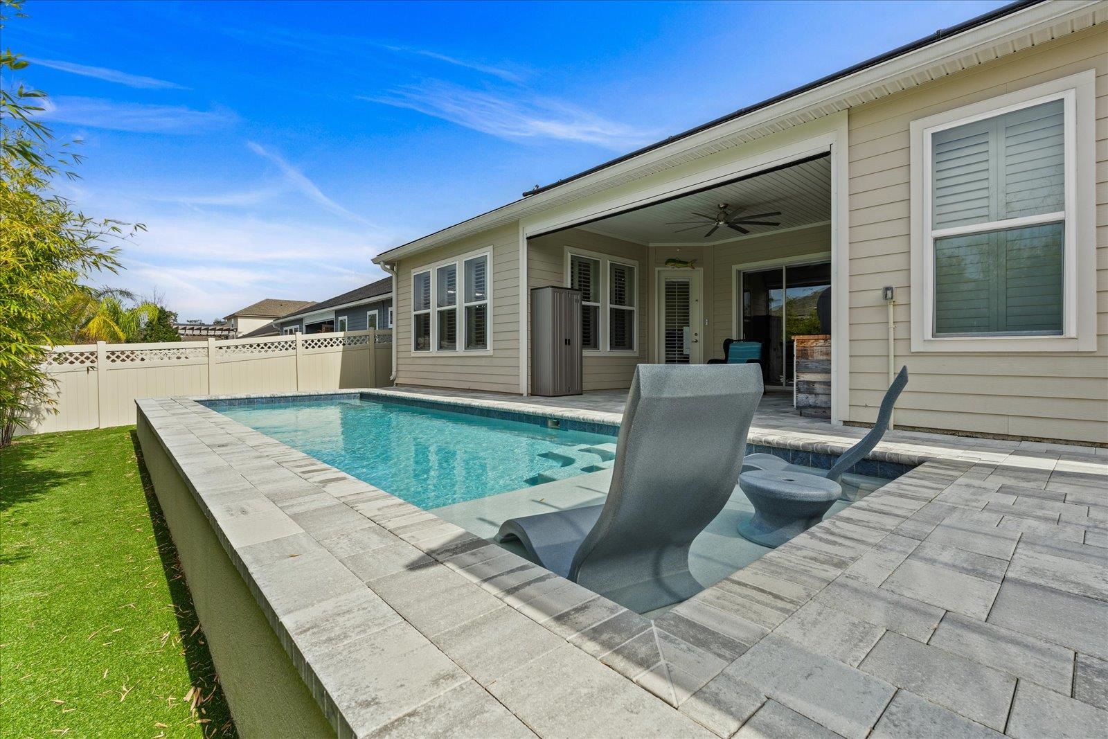 122 Kendall Way Street St. Augustine, FL 32092 - Photo 32 of 40 a view of a house with backyard and sitting area