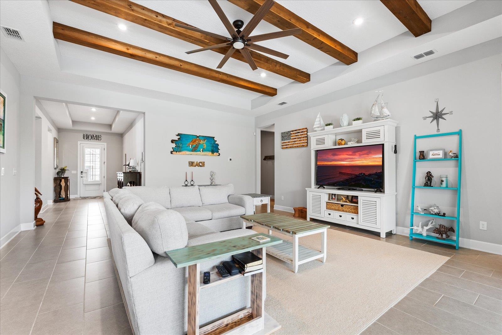 122 Kendall Way Street St. Augustine, FL 32092 - Photo 6 of 40 a living room with furniture and a flat screen tv