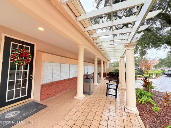 a view of a porch with seating space